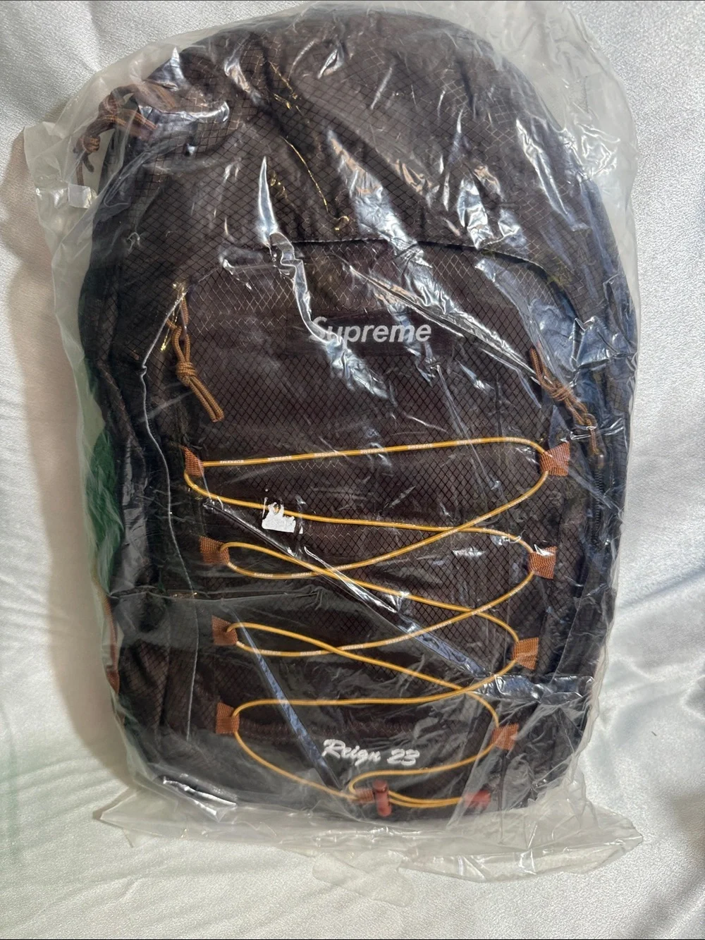 New!🔥Supreme Brown Backpack with Yellow Bungee Cord!🔥
